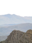 SX32815 Hiker on Watkin trail peak of Y Lliwedd.jpg